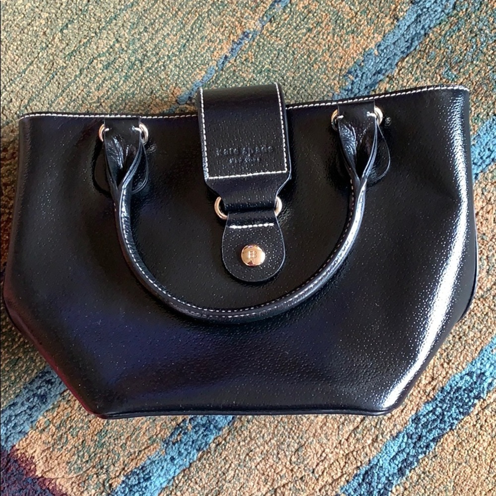 A darling, petite black handbag by Kate Spade
